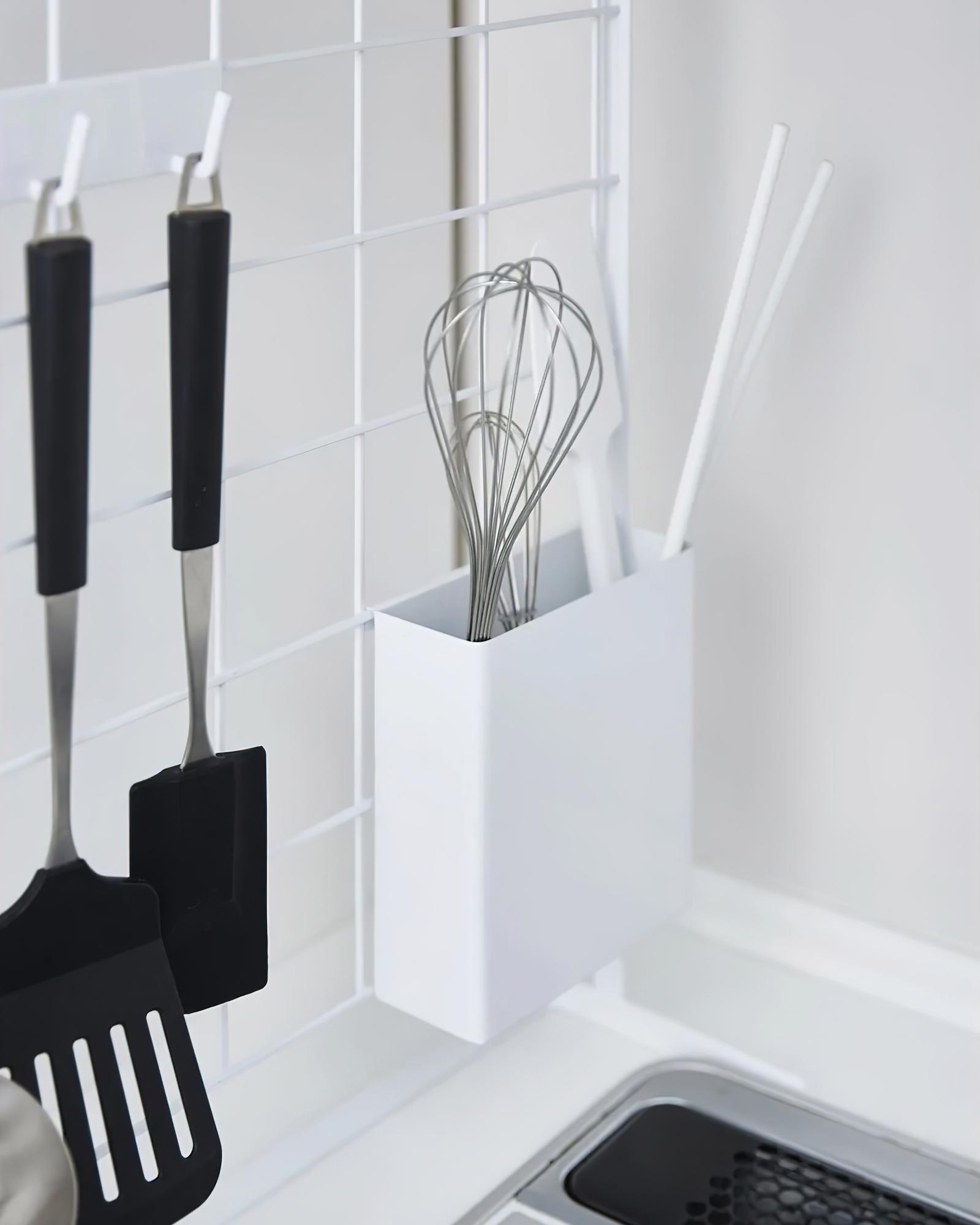 Minimal kitchen workspace with utensils